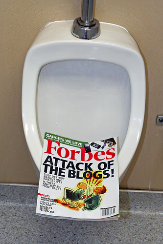 Copy of Forbes November 14, 2005 issue in a urinal.