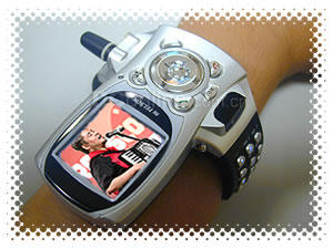 Wrist mobile phone displaying an image of Joey “Accordion Guy” deVilla playing the accordion.