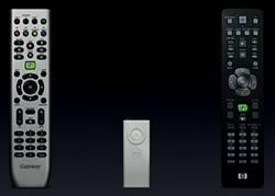 Remote controls, including the very simple AppleTV remote.
