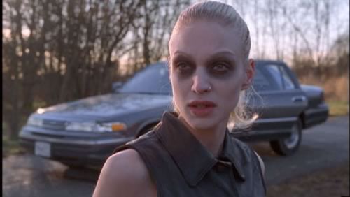 Invisigoth from the “X-Files” episode “Kill Switch” — a skinny pale blonde woman, dressed in black, wearing way too much makeup.