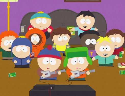 Stan and Kyle from “South Park” playing “Guitar Hero” in front of their friends