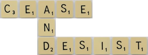 “Cease and desist” spelled out using Scrabble tiles
