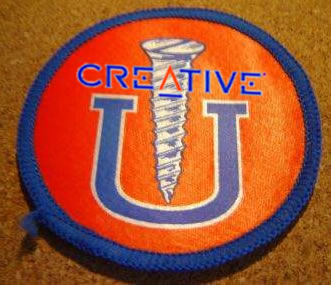 A “Screw U” patch with the Creative Labs logo overlay.