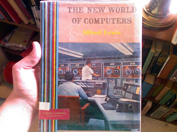 Old book: \"The New World of Computers\", featuring a late-\'60s or \'70s-era mainframe