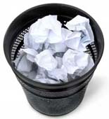 throwing out papers wastebasket