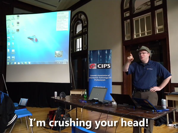 Rick Claus doing his presentation: "I'm crushing your head!"
