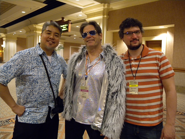 Joey deVilla in a Hawaiian shirt, Glenn block in silver lame shirt and fun fur jacket, and Glenn Block in a striped shirt