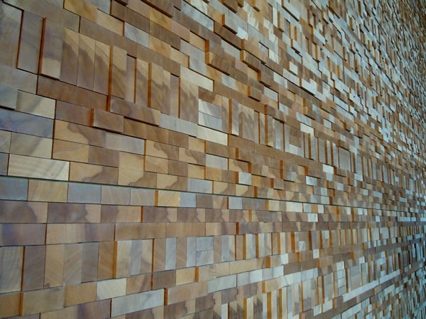 Detail of a wall inside the Vancouver Convention Centre's West Building, made up of the ends of planks of wood