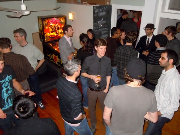 Unspace's "pinball room", filled with nerdy partygoers.
