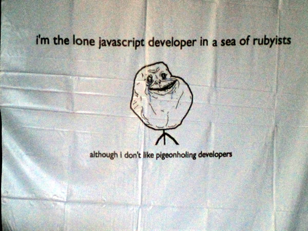 Slide: 'I'm the lone javaScript developer in a sea of Rubyists / Although I don't like pigeonholing developers.'
