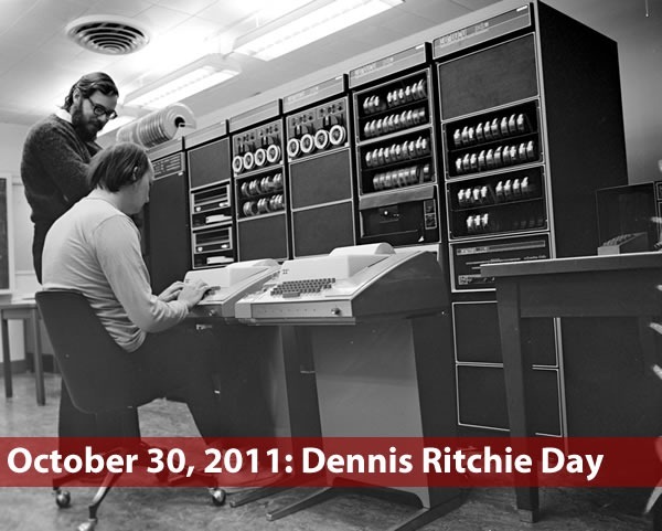 "October 30, 2011: Dennis Ritchie Day": Old photo of Dennis Ritchie and Ken Thomson working on a DEC PDP computer