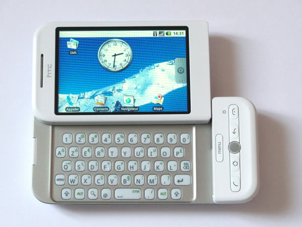 HTC Dream phone, shown in landscape mode with the sliding keyboard extended.