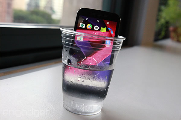 moto g in glass of water