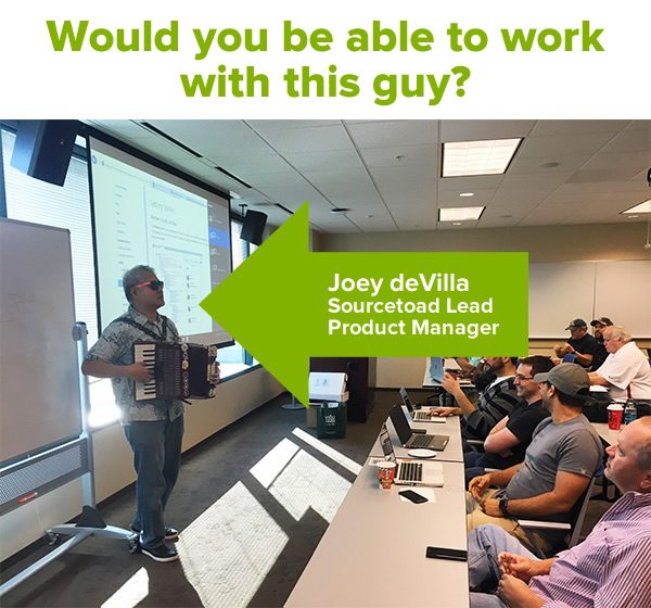 Would you be able to work with this guy? (Photo of Joey deVilla on accordion performing in front of a room full of developers.)