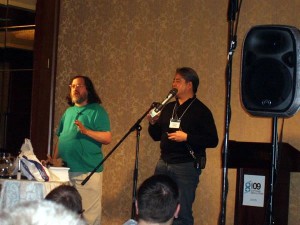 Photo: Richard M. Stallman and Joey deVilla onstage.