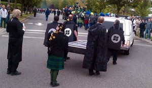 Windows Phone pallbearers marching behind a hearse