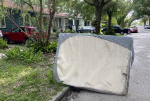 Photo: Old mattress on the side of the road, waiting for pickup