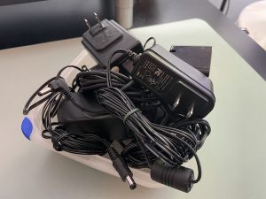 A pile of power adapters.