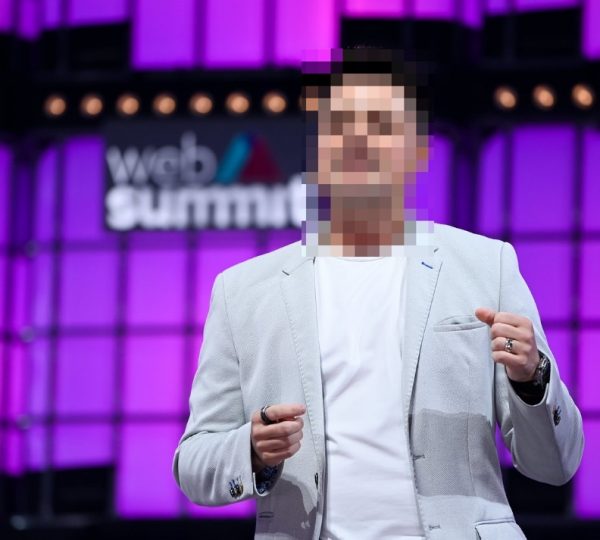 Photo of Fast’s Domm Holland, with his face blurred out.