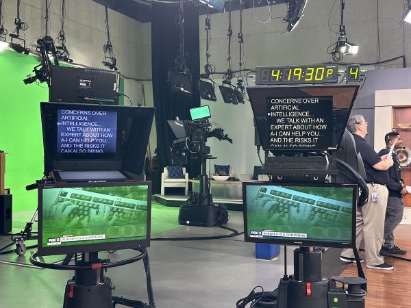 Interviewee’s-eye view of the cameras, teleprompters, and monitors at the Fox 13 News Tampa studio, as seen from the interview table.